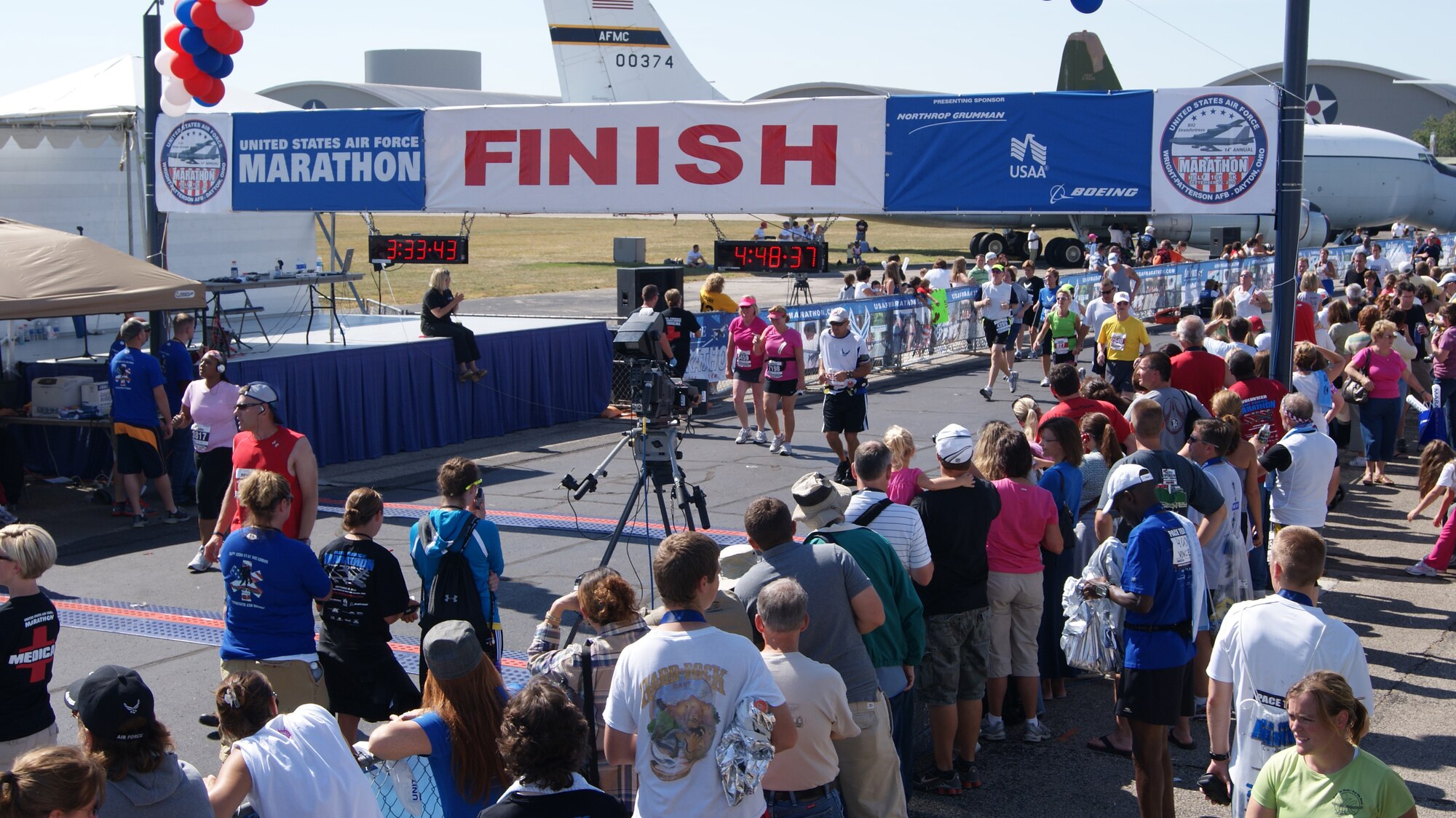 Col. Tim Lamb, 567th RED HORSE commander, crosses the finish line at the USAF Marathon with a chip time of 4:46 for the full marathon. (USAF photo by MSgt. Wendy Lopedote, 916ARW/PA)