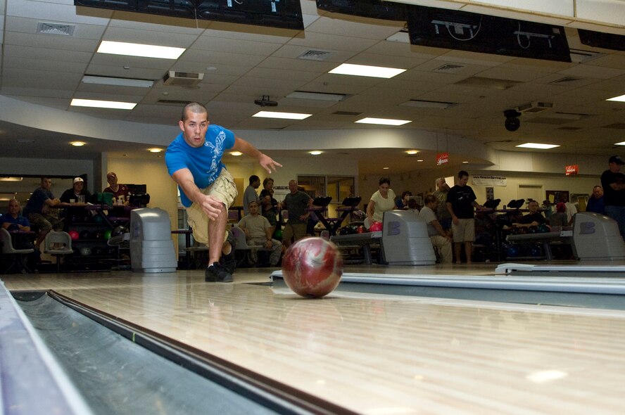 HANSCOM AIR FORCE BASE, Mass. – Antonio Maciel, a member of the Coast Guard team, releases the ball during intramural bowling on Sept. 16. The bowling league season began last week at Hanscom Lanes and will continue throughout the winter. (U.S. Air Force photo by Mark Herlihy)