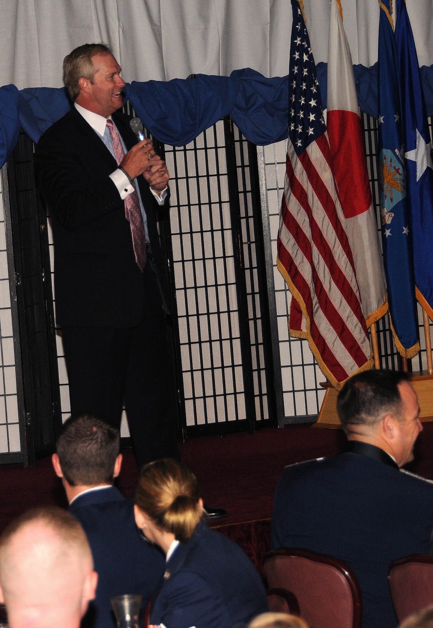 Motivational speaker Dan Clark speaks to hundreds of servicemembers, civilians and local residents celebrating the Air Force's 63rd birthday during the Air Force Ball at the Rocker NCO Club Sept. 18. The "Chicken Soup for the Soul" author and acclaimed national speaker praised servicemembers for their service and dedication. (Air Force photo/Airman 1st Class Jarvie Wallace)