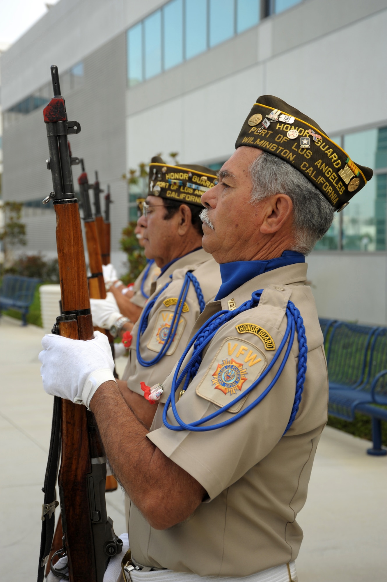 A honor guard from the Port of Los Angeles VFW post stands at attention during the POW-MIA recognition ceremony, Sept. 17.  The honor guard members fired a 21-gun salute during the ceremony honoring POW's and those still missing in action. (Photo by Joe Juarez)