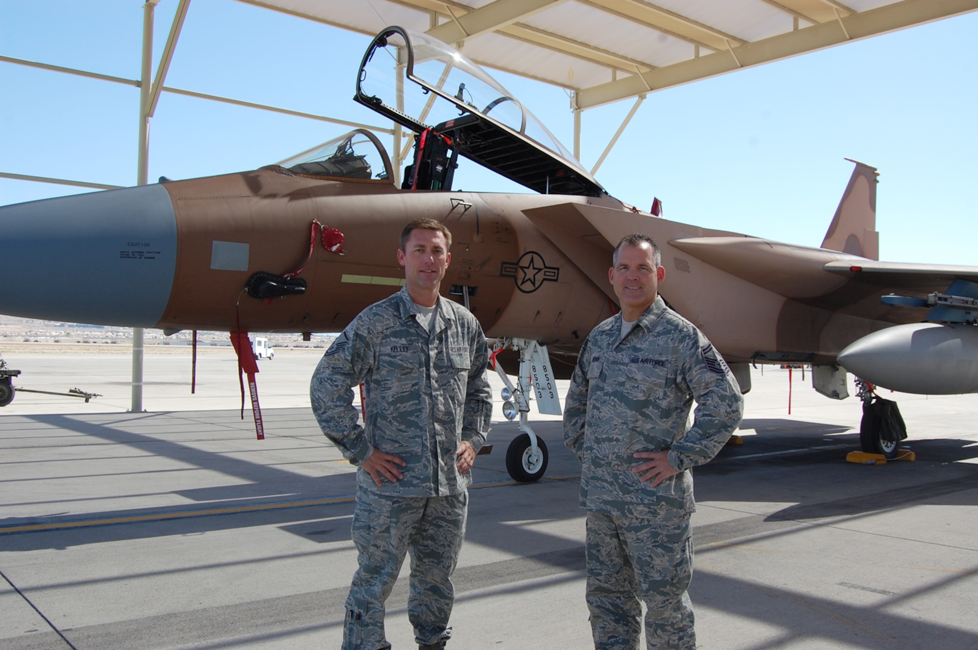 From left, Master Sgt. Kelley and Senior Master Sgt. Brunin are both maintainers with the 926th Aircraft Maintenance Squadron. They were recognized for a "job well done" during a recent dissimilar air combat training, or DACT, exercise that took place in Holloman Air Force Base, N.M. Sergeant Brunin is the production superintendent, and Sergeant Kelley is an expeditor with the 926th AMXS. Through the Air Force's Total Force Integration initiative, both Air Reserve Technicians are integrated in the Flanker Aircraft Maintenance Unit, a Regular Air Force unit here.
