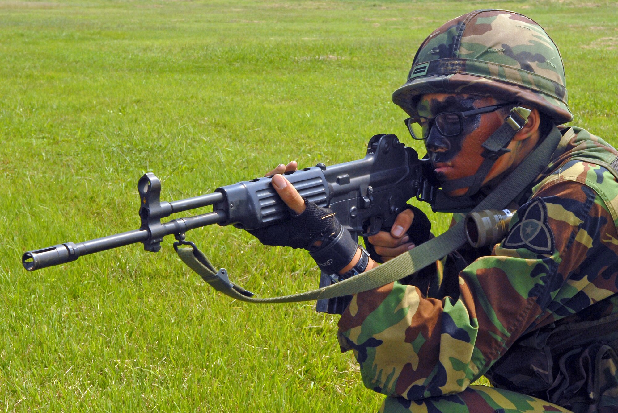 A South Korean airman stands guard at a simulated hostage exercise at the Gunsan Airport Sept. 17, 2010, at Kunsan Air Base, South Korea. The 8th Civil Engineer Squadron fire department participated in the annual exercise, which is designed to enhance counterterrorism and prepare emergency responders for real-life situations. (U.S. Air Force photo/Senior Airman Ciara Wymbs) 
