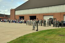 YOUNGSTOWN AIR RESERVE STATION, Ohio -- A group of families, friends and personnel assigned to Youngstown Air Reserve Station await the return of approximately 60 Citizen Airmen here, September 17. The Servicemembers from the Air Force Reserve Command?s 910th Airlift Wing were returning to the air station following a 120-day deployment to Ramstein Air Base, Germany. The aircrews and maintenance personnel were providing airlift support for U.S. Africa Command. U.S. Air Force photo by Master Sgt. Bob Barko Jr.