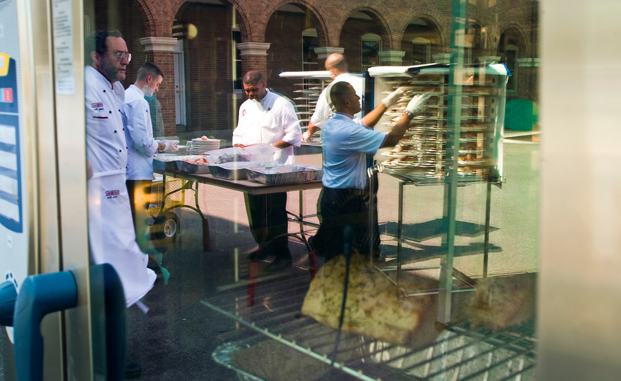 Military food service specialists along with educational chefs prepare lunch at the 7th Annual Military Culinary Competition Sept. 24, 2010, in Washington DC. (U.S. Air Force photo/Tech. Sgt. Bennie J. Davis III)