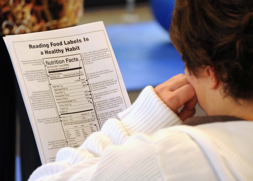 A member of Duke Field looks over an example of a nutrition label during a class on nutrition and healthy eating at the fitness center Sept. 24.  The Eglin Air Force Base Health and Wellness Center conducted the class for reservists and civilian employees at Duke Field.  The class provided tips and information on reading nutrition labels, mindful eating habits and learning to modify recipes to make them a more healthy choice.  (U.S. Air Force photo/Staff Sgt. Jonathan McCallum)