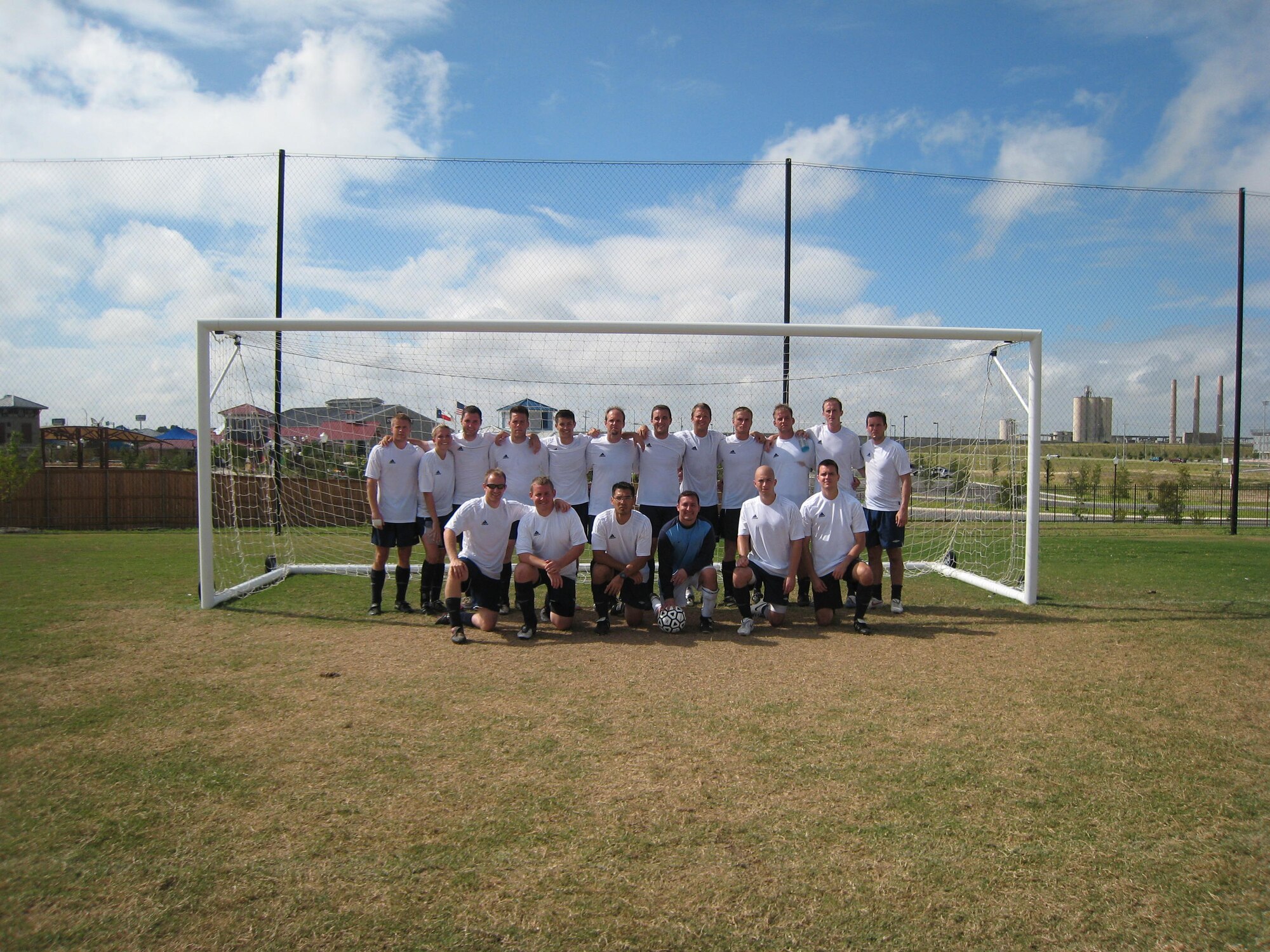 The BLAZE Soccer Team recently traveled to San Antonio, Texas, over Labor Day weekend to compete in the annual Defender's Cup Military Soccer Tournament. Team members shown in the photo are: Capt Eric Peterson, Kate Wells, Airman Steve Ferrell, 1st Lt. Matt Downing, 2nd Lt. Richard Nova, Steve Herbert, Capt. Justin Crawford, 2nd Lt. Geoff Hanson, 2nd Lt. Taylor Giffen, 2nd Lt. Nick Kellenbence, 1st Lt. Chris Brown, 1st Lt. Daniel Trueblood, (bottom row)-2nd Lt. Jon Kay, 2nd Lt. T.J. Schneider, Capt. Jason Raines, Danny Padilla, 2nd Lt. Nicholas Jacks, and Capt. Mike Wells. (U.S. Air Force photo).