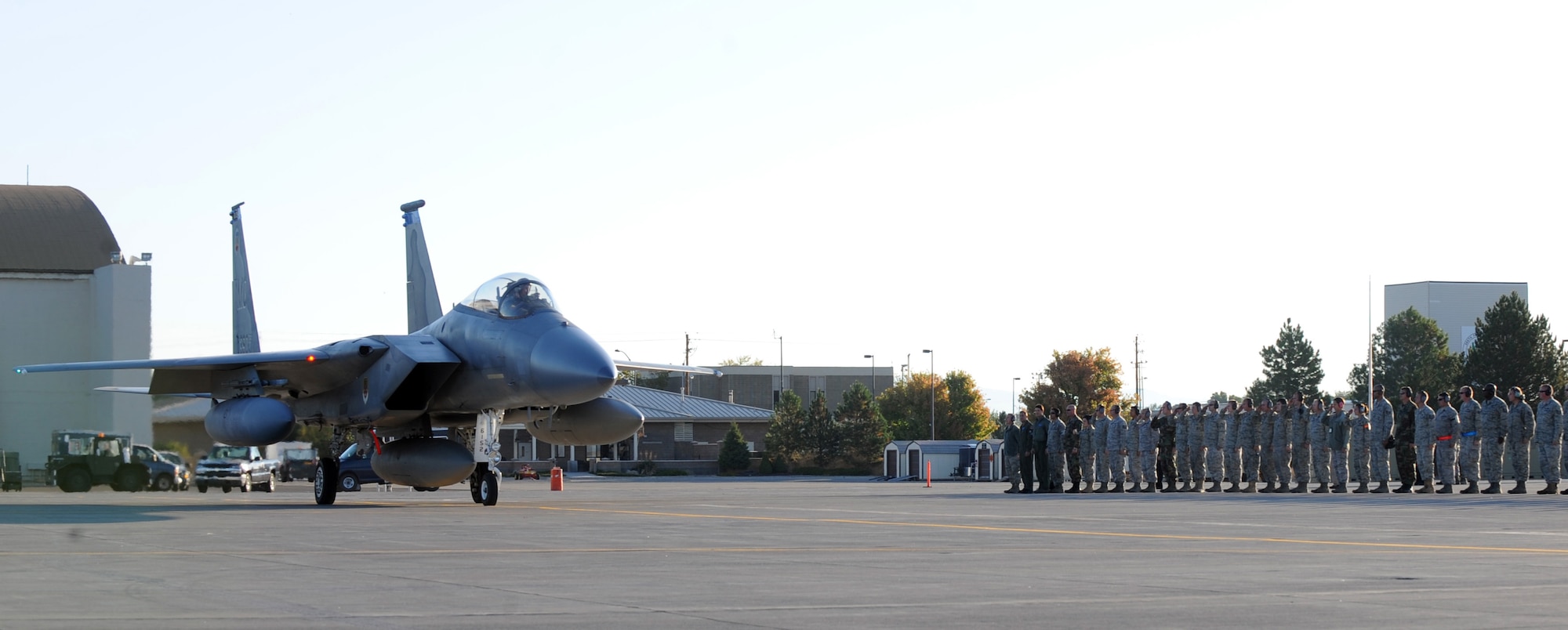 MOUNTAIN HOME AIR FORCE BASE, Idaho – Airmen from the 390th Fighter Squadron salute as one of the last two F-15C Eagles assigned to the squadron taxis to make its final departure Sept 23. The jets will become part of the Florida Air National Guard’s 125th Fighter Wing, stationed in Jacksonville. The first F-15C arrived here in February of 1992, and the last two will leave September 23rd, 2010 after more than 18 years of flying the Idaho skies from Mountain Home Air Force Base. (U.S. Air Force photo by Senior Airman Debbie Lockhart)