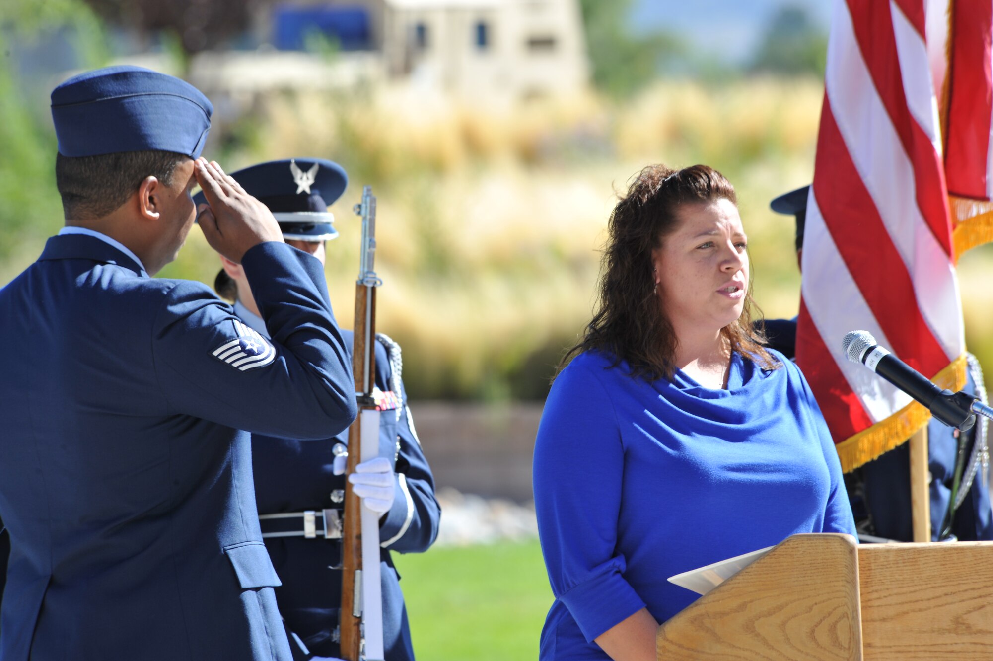 Robyn Tarin sings the national anthem during the National POW/MIA Recognition Day ceremony Sept. 17 at the New Mexico Veterans Memorial.  U.S. Air Force Photo by Elizabeth Martinez