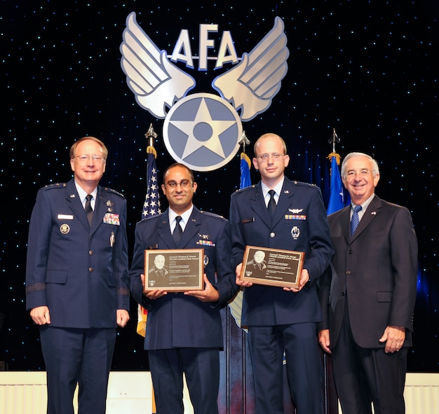 WASHINGTON (AFNS) -- Capts. Hameer Thatte and Adrian Zollinger, 91st Operations Support Squadron weapons and tactics planner and instructor, received the Gen. Thomas S. Power Award 2009 for the best overall missile crew in the Air Force during the Air Force Association 2010 Air and Space Conference in Washington, D.C., Sept. 13. The crew was recognized for their hard work and dedication to the successful mission of Air Force Global Strike Command's missile deterrence force found in the 91st Missile Wing’s Minuteman III's at Minot Air Force Base, N.D. (U.S. Air Force photo by Michael J. Pausic)