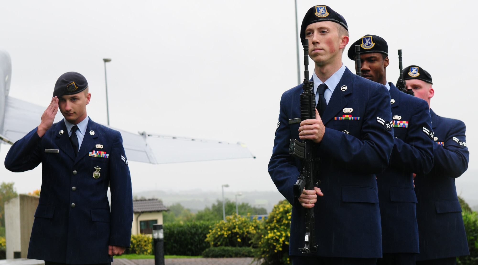 SPANGDAHLEM AIR BASE, Germany – Members of the 52nd Security Forces Squadron render honors during the playing of Taps at the ceremony’s closing Sept. 24.  Taps replaced the initial lights out call for servicemembers but has since served to honor those who sacrifice in the defense of the U.S. (U.S.  Air Force photo/Staff Sgt. Heather M. Norris)