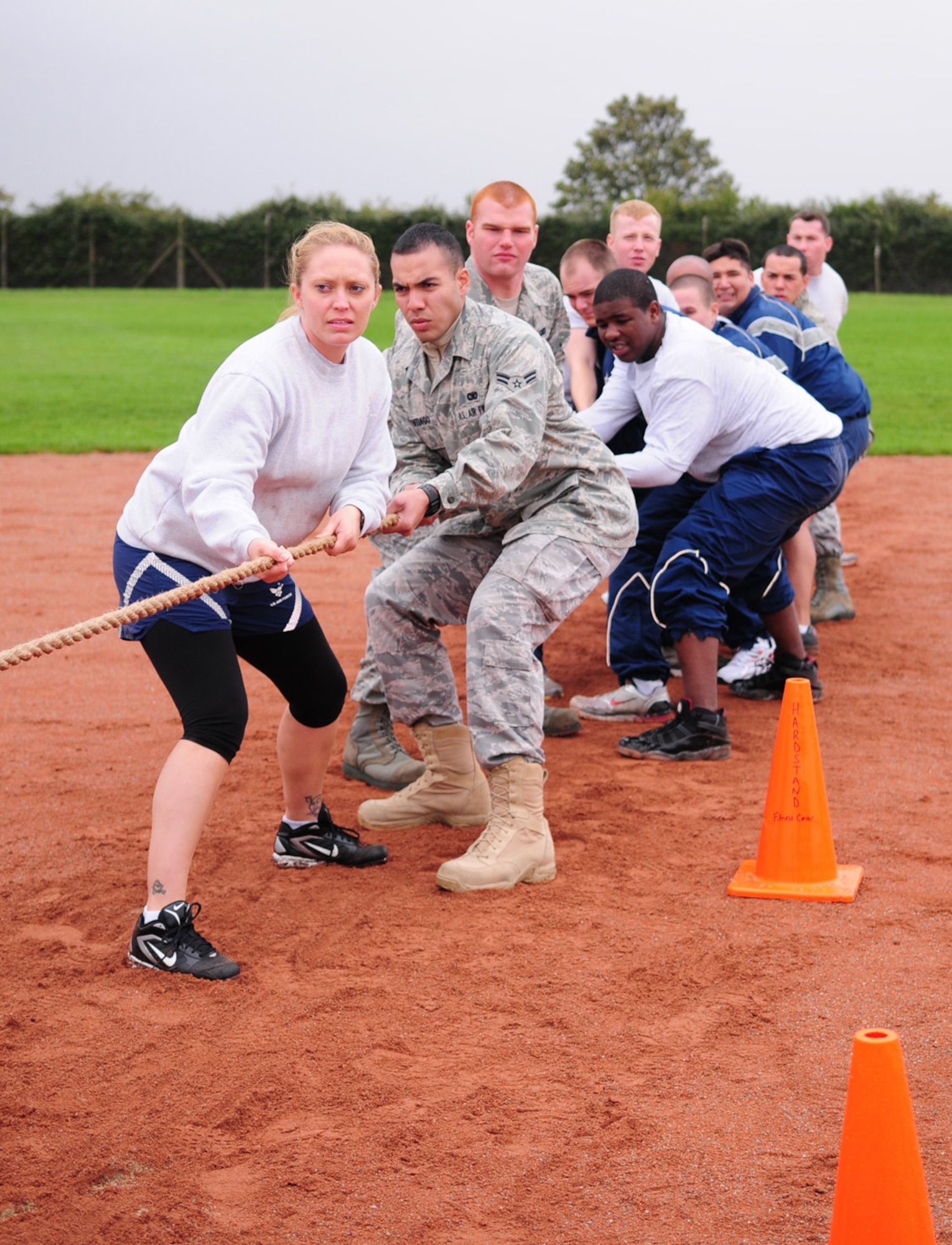 RAF MILDENHALL, England -- Members of the 100th Security Forces Squadron get ready for the start of the tug-of-war at the Wing Sports Day Sept. 24. They battled and won against the 100th Maintenance Squadron team, but came second to the 488th Intelligence Squadron. Despite a very wet, cold day, Team Mildenhall members came out to participate in the sports events. (U.S. Air Force photo/Karen Abeyasekere)