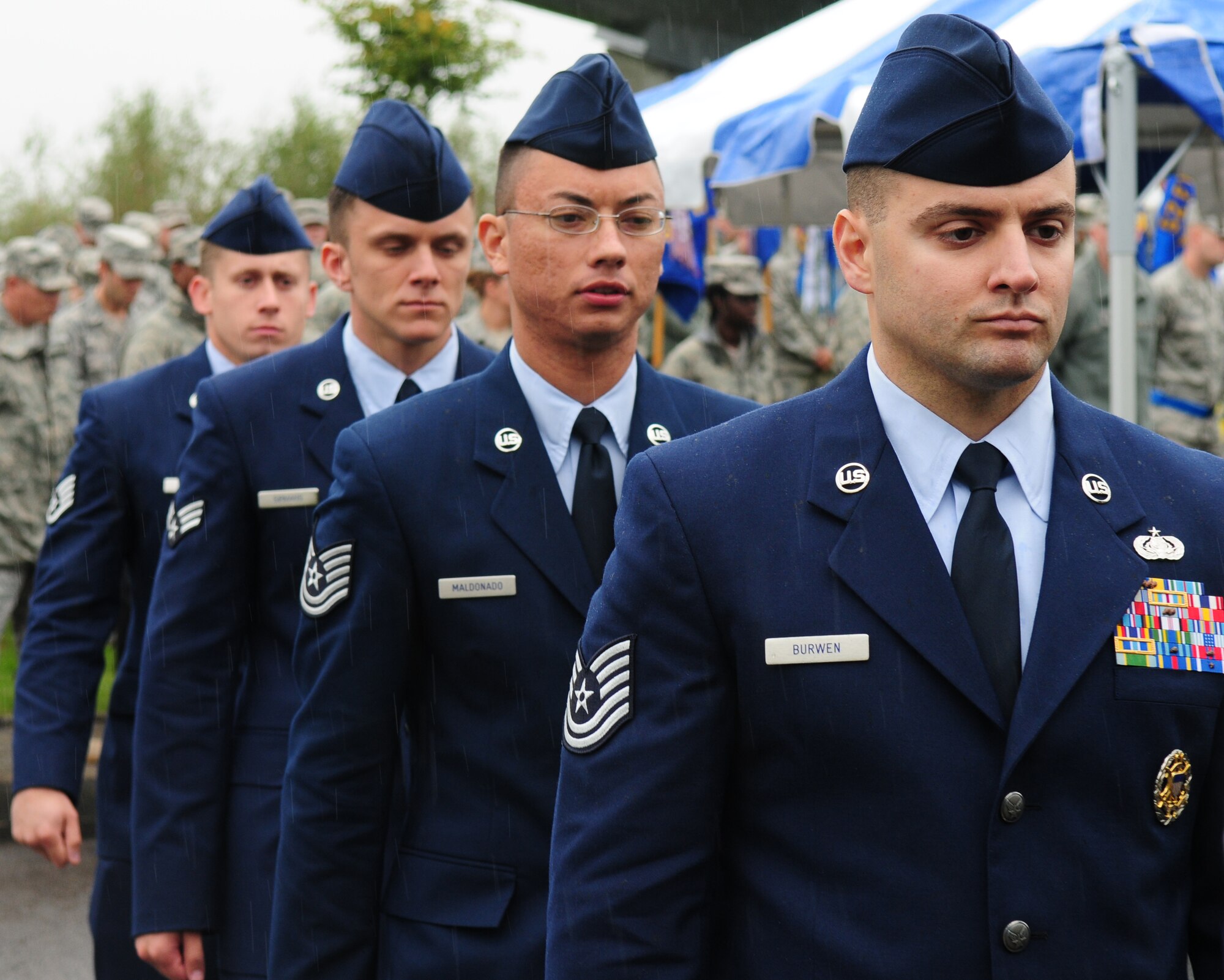 SPANGDAHLEM AIR BASE, Germany – Airman march forward toward the podium to recite the code of conduct as part of the prisoner of war missing in action ceremony Sept. 24.  Members attended to pay tribute and honor to the sacrifices of fellow servicemembers and their families (U.S.  Air Force photo/Staff Sgt. Heather M. Norris)