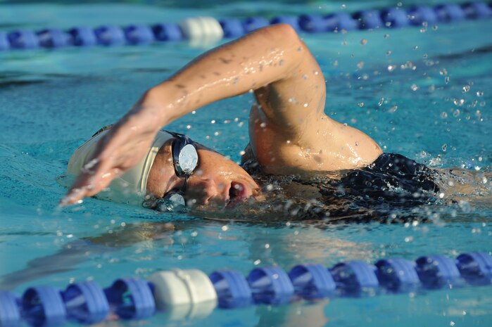 Capt. Jamie Turner swims in Charleston, S.C., Sept. 15, 2010, in preparation for the Ironman World Championship. Captain Turner is training to swim 2.4-miles through ocean waves, bike 112 miles and run a 26.2-mile marathon through challenging lava-covered terrain. During her peak training, she will swim more than 10,000 meters. Selected as one of 1,800 Ironman World Championship competitors, she will test her endurance in one of the top athletic challenges the sports world has to offer. Captain Turner is a pilot with the 315th Airlift Wing. (U.S. Air Force photo/James M. Bowman)