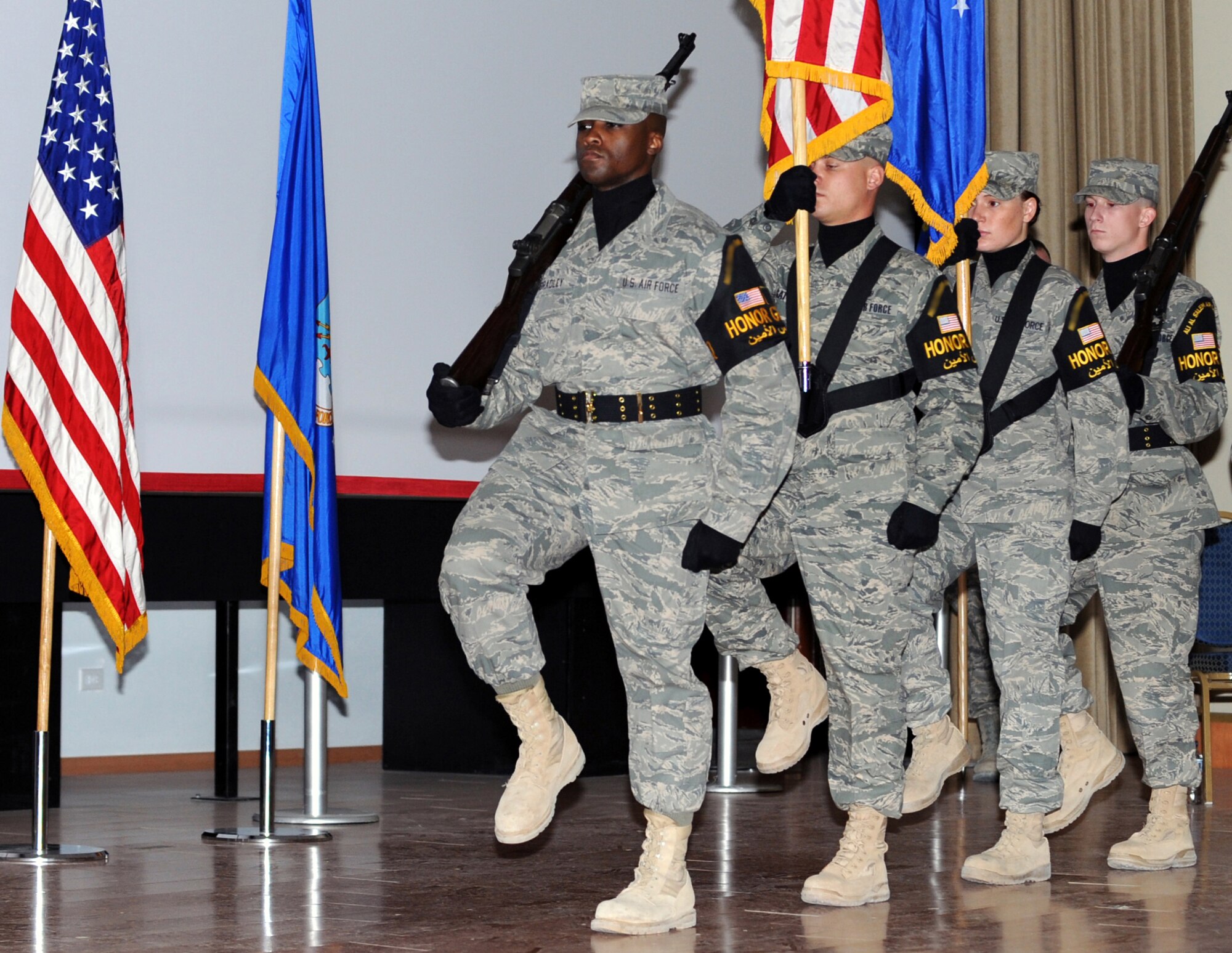 SOUTHWEST AISA -- Members of the 386th Air Expeditionary Wing Honor Guard mark the start of every ceremony here with a precisely choreographed display of military protocol, perfected through countless hours of drill. The 45-member team is continuing to grow thanks to a high level of participation. (U.S. Air Force photo by Senior Airman Laura Turner)