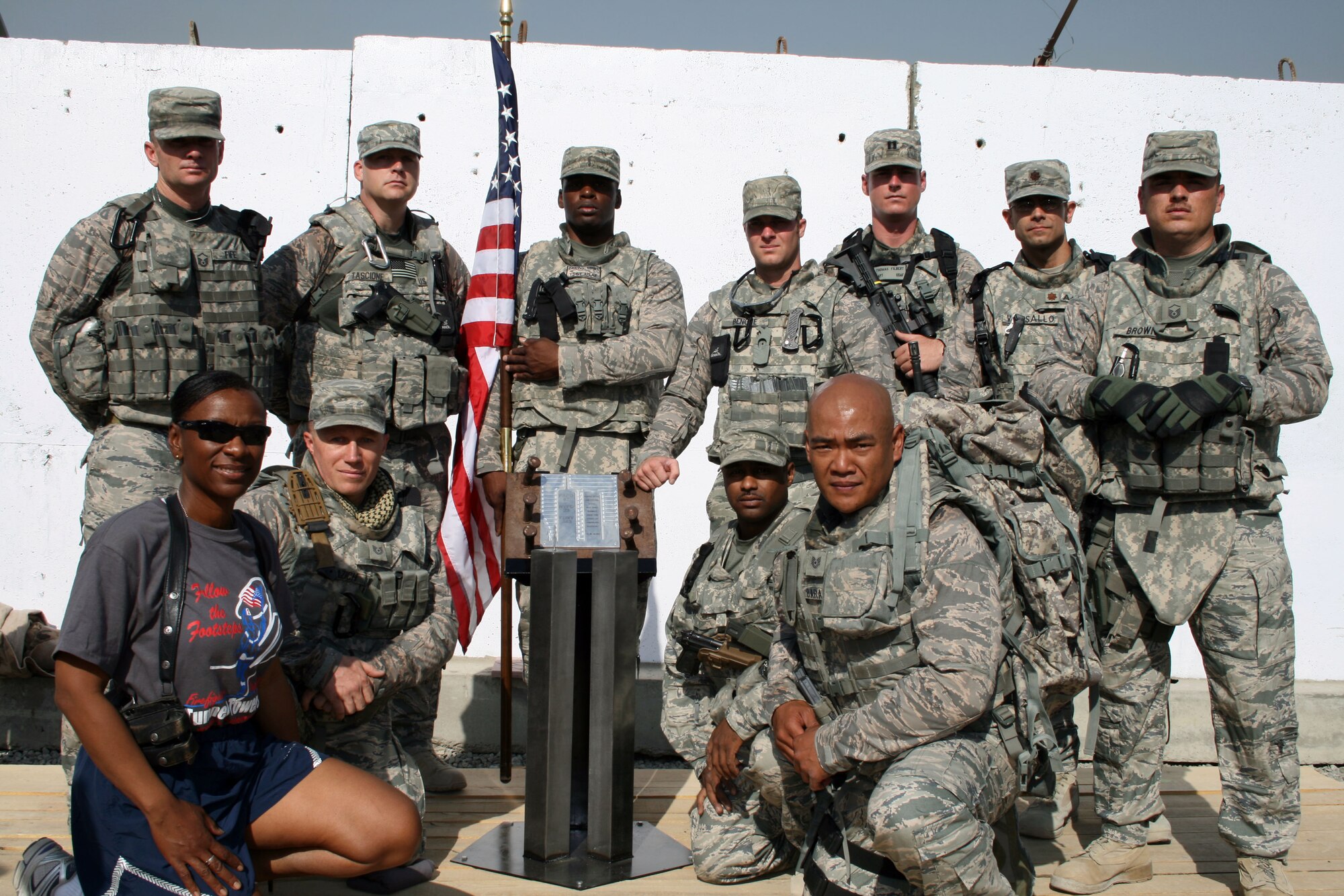 100924-F-8476C-005 KABUL, Afghanistan - NATO Air Training Command- Afghanistan personnel alongside NATO and civilian partners participate in the "Tunnel to Towers run/walk race on Sep. 24, 2010. The race was held on the International Security Assistance Force and Afghan Air Force base in Kabul, Afghanistan. The race is to commemorate the arduous run made by New York City Firefighter Stephen Siller, who during the events of 9/11 picked up his gear weighing 75 pounds and ran to the twin towers nearly three miles away and perished alongside his fellow firefighters in the attempt to save lives. After the race a piece of steel was placed in a memorial on the grounds of the AAF base where it will stay until the last American leaves Afghanistan. (US Air Force photo by Capt. Israel Camacho/ RELEASED).