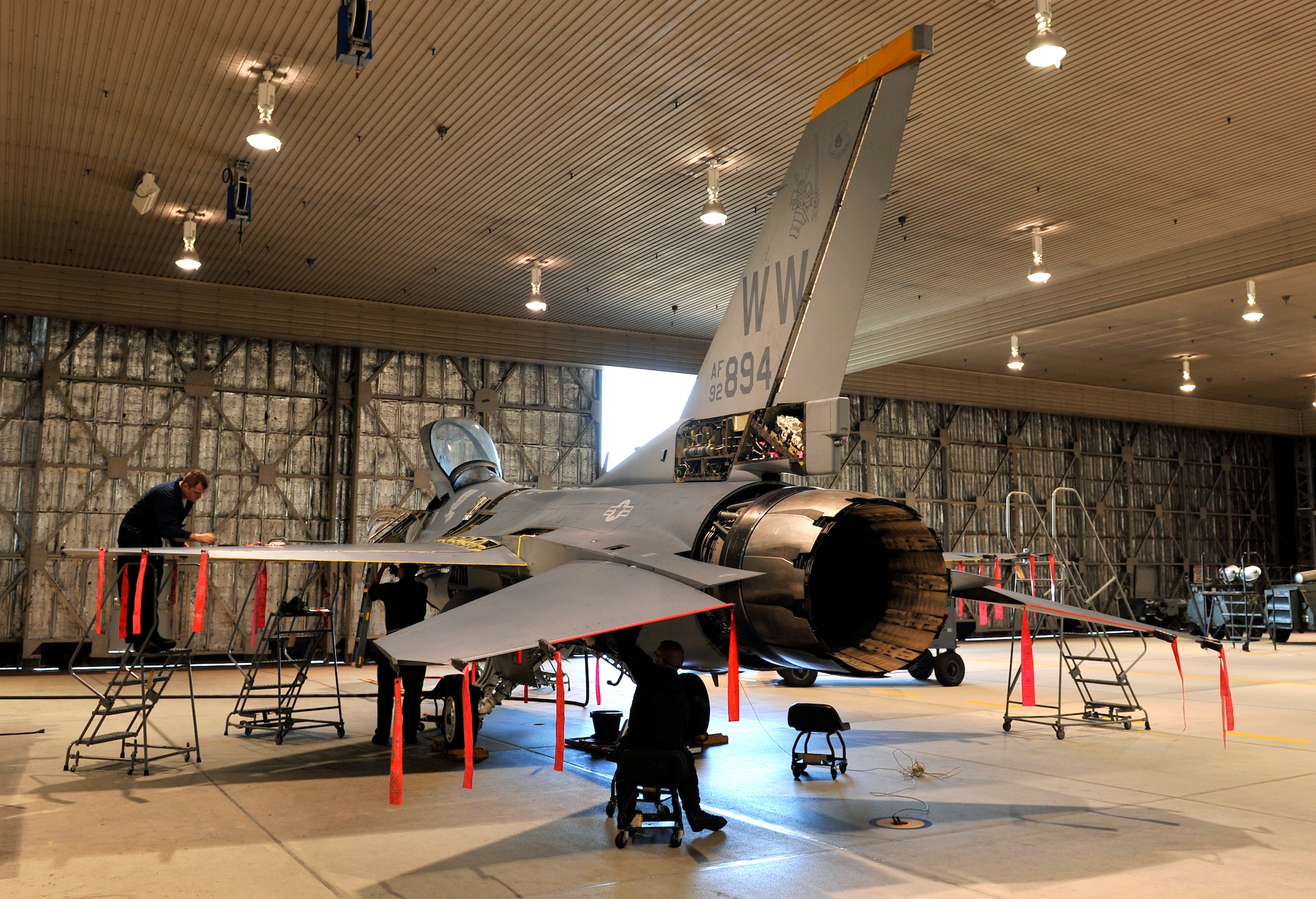 Airmen from the 35th Maintenance Squadron inspect and maintain an F-16 Fighting Falcon, Sept. 22, 2010, at Misawa Air Base, Japan. The jet was in for routine maintenance. (U.S. Air Force photo by Staff Sgt. Chad C. Strohmeyer/Released)