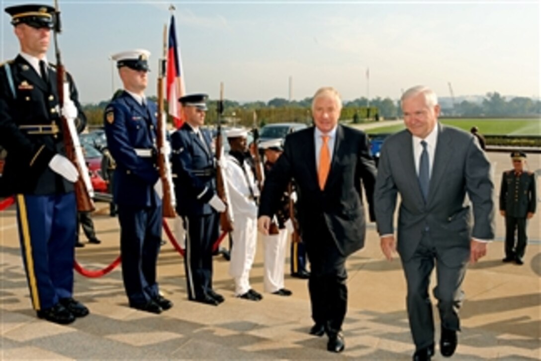 Secretary of Defense Robert M. Gates (right) escorts Chilean Defense Minister Jaime Ravinet through an honor cordon and into the Pentagon on Sept. 24, 2010.  Gates and Ravinet will hold security discussions on a variety of issues of mutual interest to both nations.  
