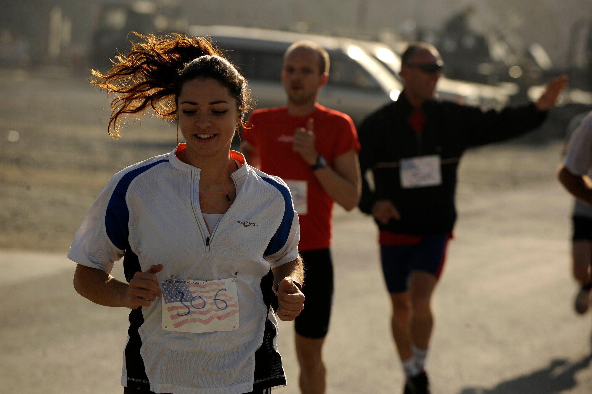 Runners from 15 different countries participate in the Firefighter Stephen Siller Tunnel to Towers 5k Run/Walk at Kabul International Airport, Afghanistan, Sept. 24, 2010.  Nearly 400 runners participated in honor of all those that gave their lives on Sept. 11, 2001.  (U.S. Air Force Photo/Staff Sgt. Eric Harris) (RELEASED)