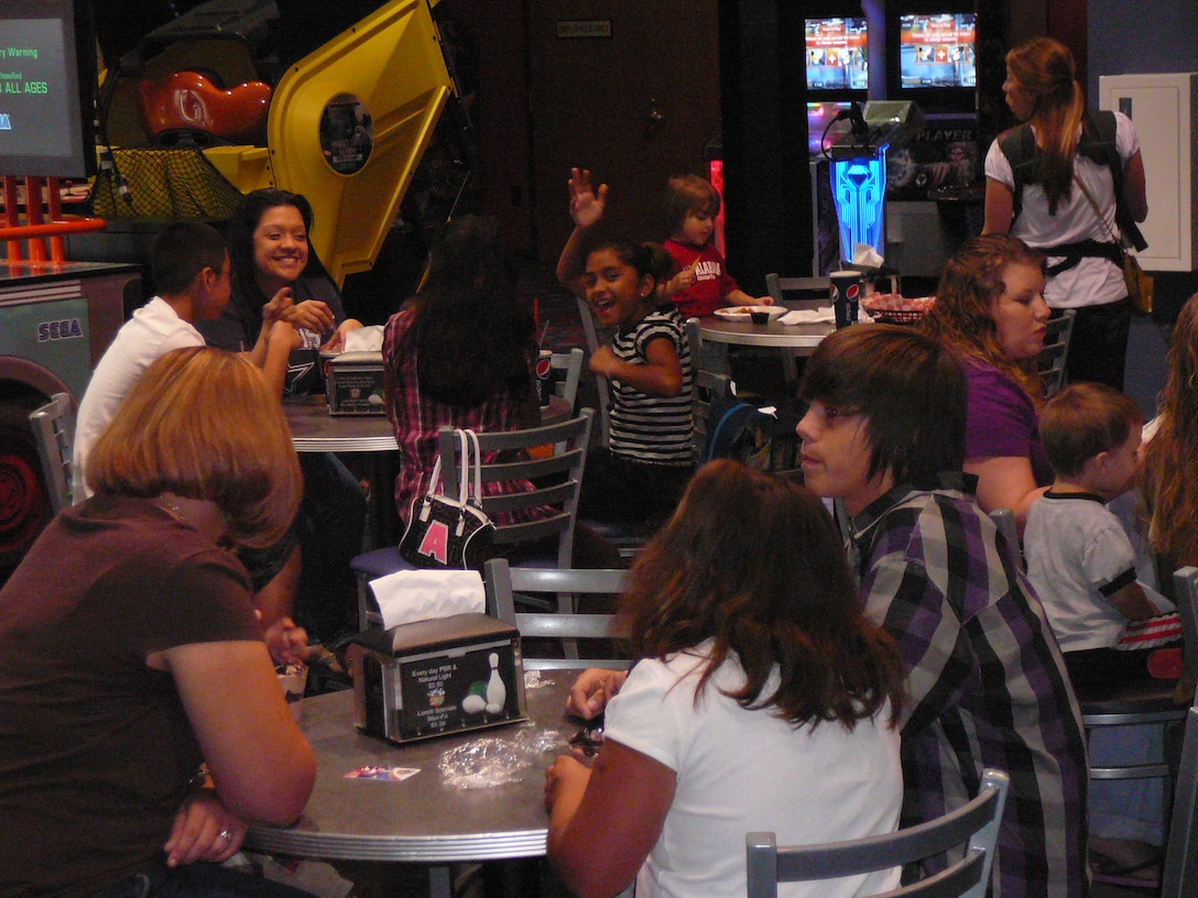 Family members from 1st Battalion, 8th Marines, enjoy a family event at MacDaddys in Cape Carteret, N.C., Sept. 20.