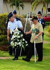 ANDERSEN AIR FORCE BASE, Guam ? 36th Wing commander, Brig. Gen. John Doucette and Francisco Carbullido, a former prisoner of war (POW)  place the ceremonial wreath during the Prisoner of War/Missing In Action ceremony here, Sep. 25. The POW/MIA ceremony commemorates those returned and those still missing and unaccounted for from our nation's wars. (U.S. Air Force photo by Airman 1st Class Jeffrey Schultze)