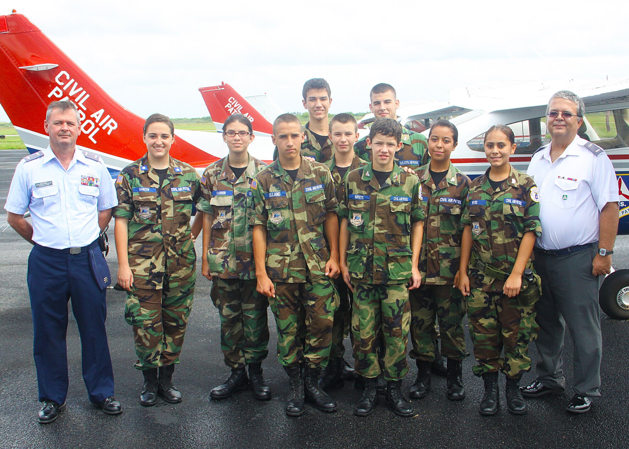 The 279th Civil Air Patrol during a Young Eagles Flight event at Homestead General Aviation Airport; Sep. 25.The 279th C.A.P was in attendance to help out. Junior members of the unit were instructed on crowd control and aircraft marshaling. The 279th C.A.P. is based at Homestead Air Reserve Base. The C.A.P is the civilian auxiliary to the U.S. Air Force. (U.S. Air Force photo/ Ian Carrier)