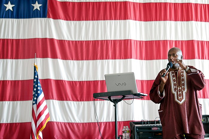 NELLIS AIR FORCE BASE, Nev.-- Leon Gilliam, formerly of the Platters, entertains the guests at the 2010 Retiree Appreciation Day Sept. 25. The event offered health screenings, a K-9 demonstration, entertainment, door prizes and a free lunch for 800 attendees at the Thunderbird hangar.  (U.S. Air Force photo by Lawrence Crespo)