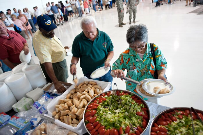 NELLIS AIR FORCE BASE, Nev.-- Southern Nevada retirees were recognized and honored for their service Sept. 25 at the 2010 Retiree Appreciation Day.  The event included health screenings, K-9 and explosive ordnance disposal demonstrations, entertainment, door prizes and a free lunch for more than 800 attendees at the Thunderbird hangar. (U.S. Air Force photo by Lawrence Crespo)