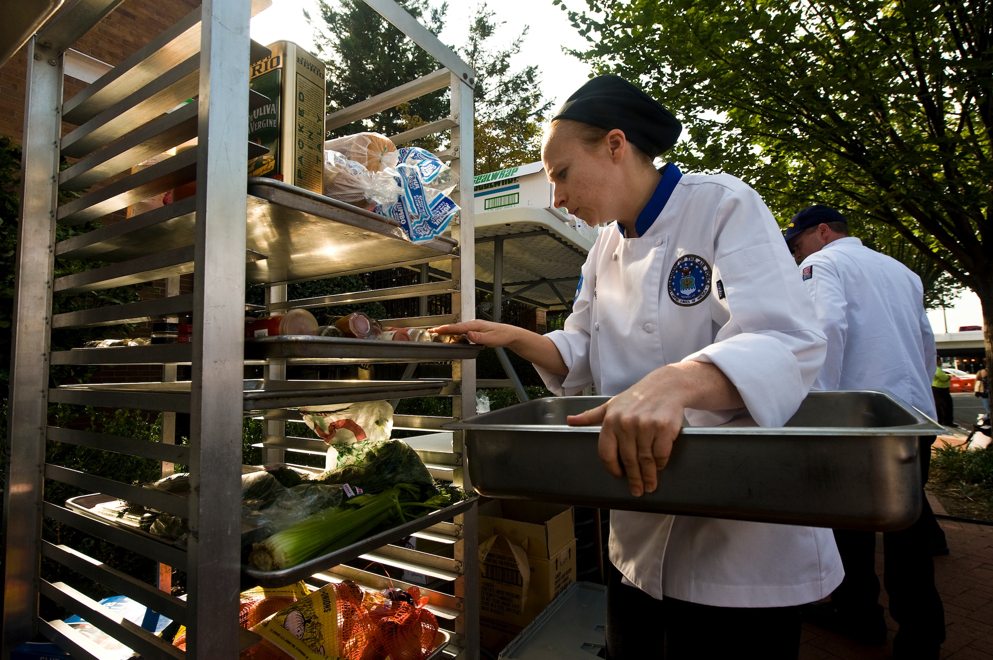 Tech. Sgt. Pam Peyton searches through spices in the community pantry while preparing for the 7th Annual Military Culinary Competition Sept. 25, 2010, in Washington, D.C. Teams were given 30 minutes to prepare a menu and two hours cooking time to create a meal. Sergeant Peyton is the front house manager of the Air Force executive dinning facility at the Pentagon. (U.S. Air Force photo/Tech. Sgt. Bennie J. Davis III)