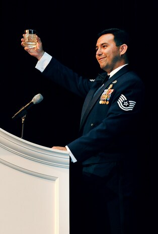 LAS VEGAS --  Tech. Sgt. Eduardo Soto, 99th Ground Combat Training Squadron Integrated Defense instructor, raises his glass for a toast during the Nellis-Creech Air Force Ball Sept. 25 at the Bellagio Resort and Casino. (U.S Air Force Photo / Senior Airman Stephanie Rubi)