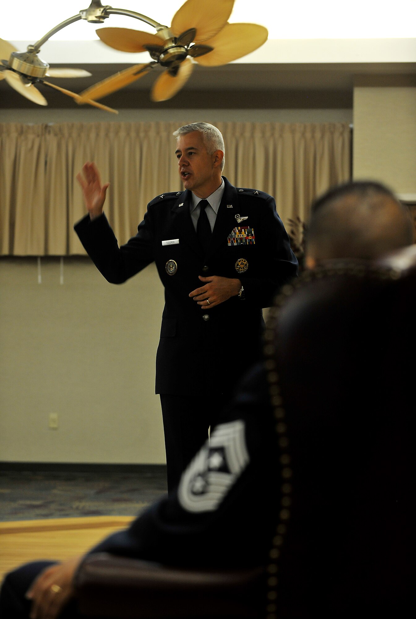 MOODY AIR FORCE BASE, Ga. -- Brig. Gen. Kenneth Todorov, Director, Standing Joint Force Headquarters, U.S. Northern Command, Peterson Air Force Base, Colo. speaks on past experiences at Chief Master Sergeant Paul Burgess, former Command Chief Master Sergeant, 332d Air Expeditionary Wing, Joint Base Balad, Iraq retirement here Sept. 10. According General Todorov, former 23rd Wing commander, the two of them have been close friends for 22 plus years and “and although there are any number of great chiefs that would have done a great job as my command chief since we shared the special bond of friendship made it – hands down – he was the right guy for me when choosing a command chief.” (U.S. Air Force photo/Airman 1st Class Joshua Green)
