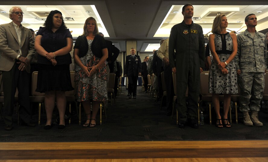 MOODY AIR FORCE BASE, Ga. -- Brig. Gen. Kenneth Todorov, Director, Standing Joint Force Headquarters, U.S. Northern Command, Peterson Air Force Base, Colo. and Chief Master Sergeant Paul Burgess, former Command Chief Master Sergeant, 332d Air Expeditionary Wing, Joint Base Balad, Iraq make their entrance at Chief Burgess’s retirement here Sept. 10. Retirement ceremony attendees ranged from family members, the 23rd Wing commander to Chief Burgess’ first supervisor in the Air Force. (U.S. Air Force photo/Airman 1st Class Joshua Green)
