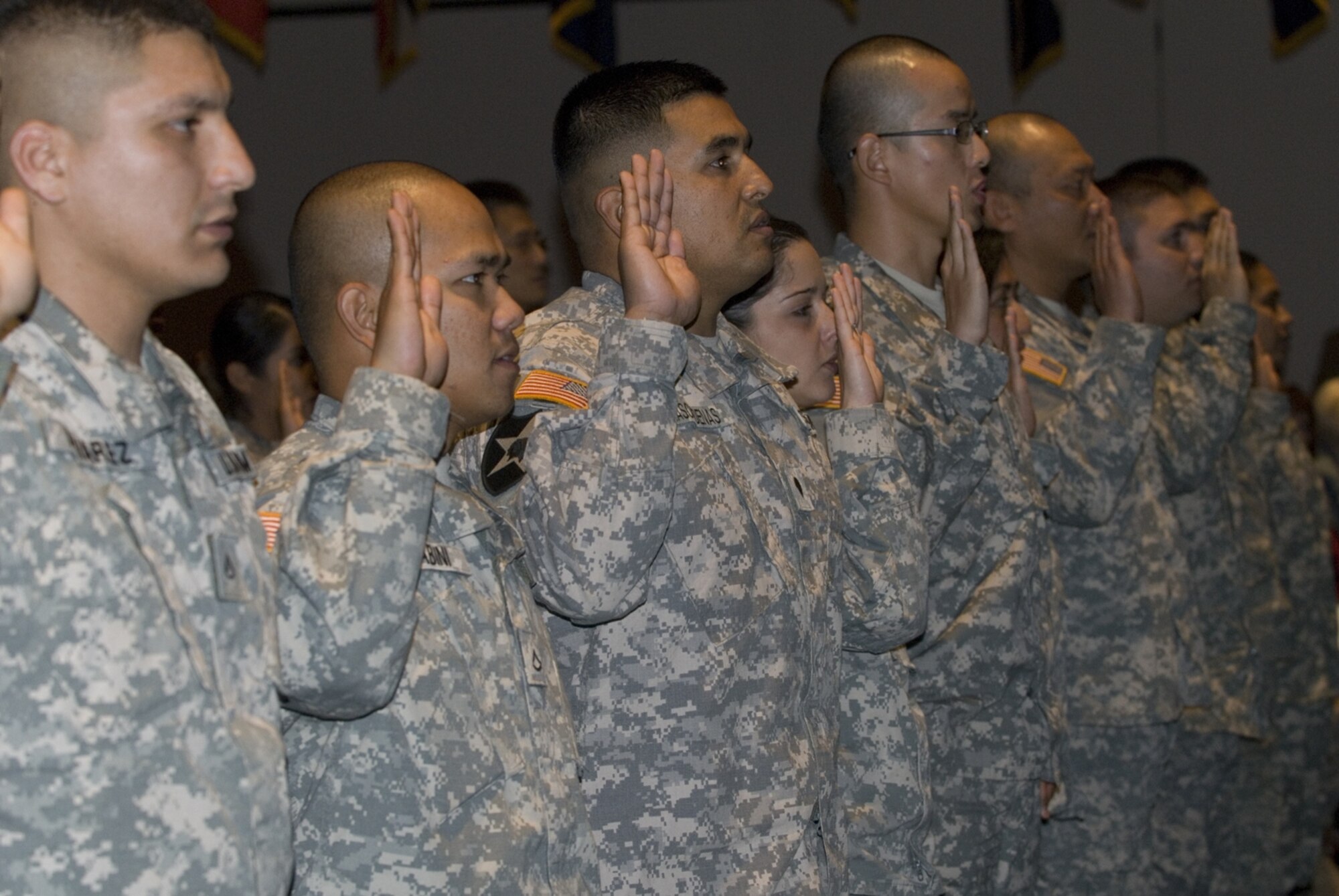 Twenty-four servicemembers swear in, becoming American citizens at the Annual Naturalization Ceremony Sept. 17 at the McChord Field Co-Located Club, Wash. (U.S. Army Photo/Pfc. Shakia M. Howard)