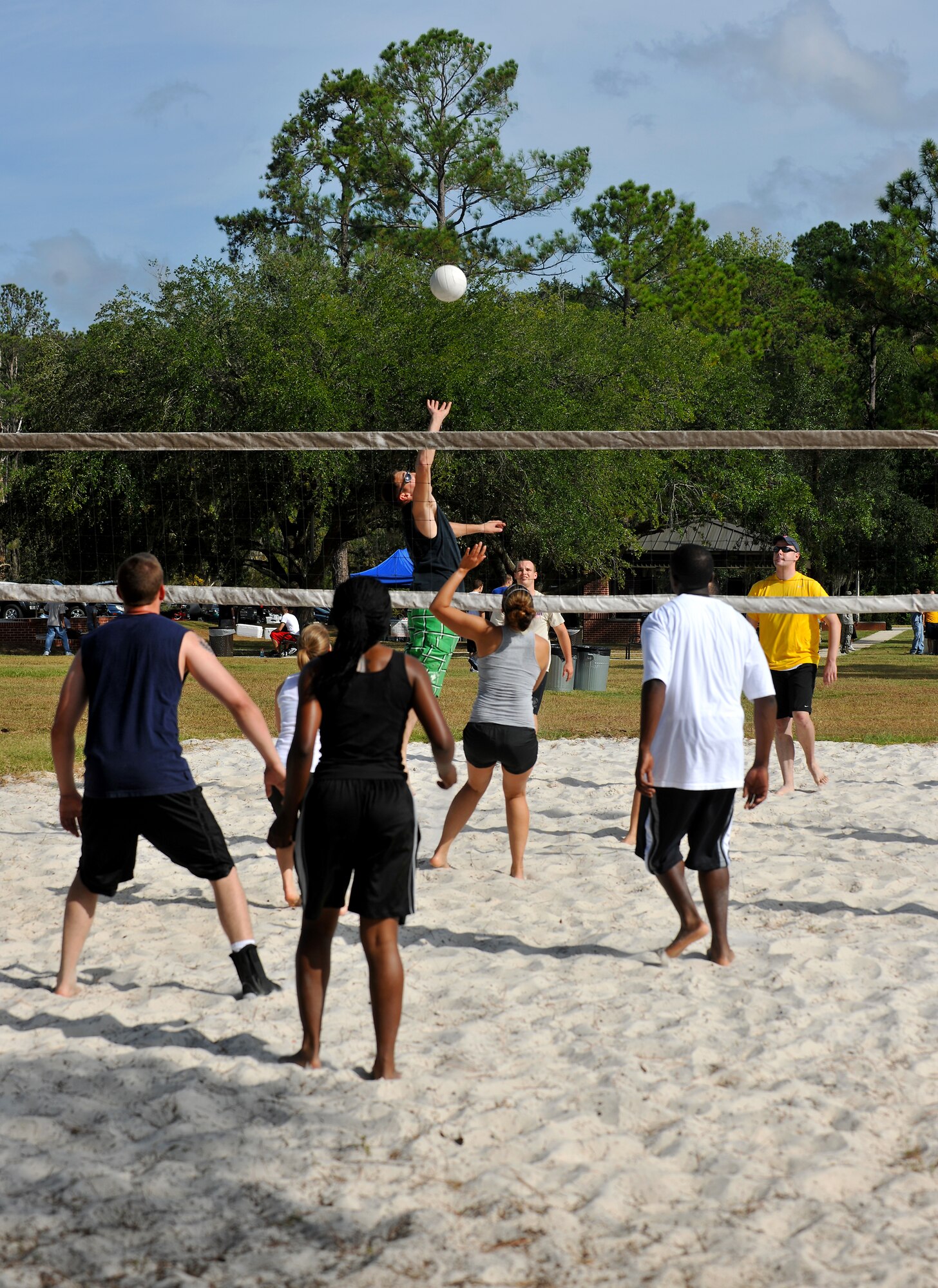 MOODY AIR FORCE BASE, Ga. -- Airmen prepare for a spike during a volleyball game at Airmen Appreciation Day here Sept. 24. Aside from activities to participate in, Airmen were fed and entertained during the event. (U.S. Air Force photo/Airman 1st Class Joshua Green)
