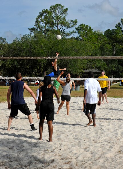 MOODY AIR FORCE BASE, Ga. -- Airmen prepare for a spike during a volleyball game at Airmen Appreciation Day here Sept. 24. Aside from activities to participate in, Airmen were fed and entertained during the event. (U.S. Air Force photo/Airman 1st Class Joshua Green)
