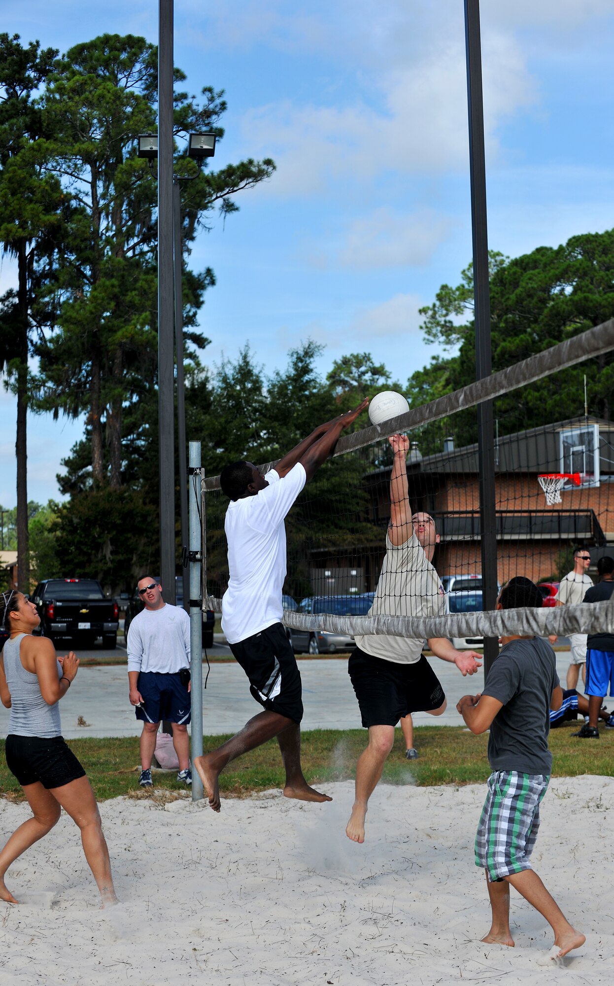 MOODY AIR FORCE BASE, Ga. -- As one Airman goes up for a spike, the other individual is blocked during Airmen Appreciation day here Sept. 24. The ranks of Senior Airman and below participated in a volleyball match as well as other activities provided through the day. (U.S. Air Force photo/Airman 1st Class Joshua Green)
