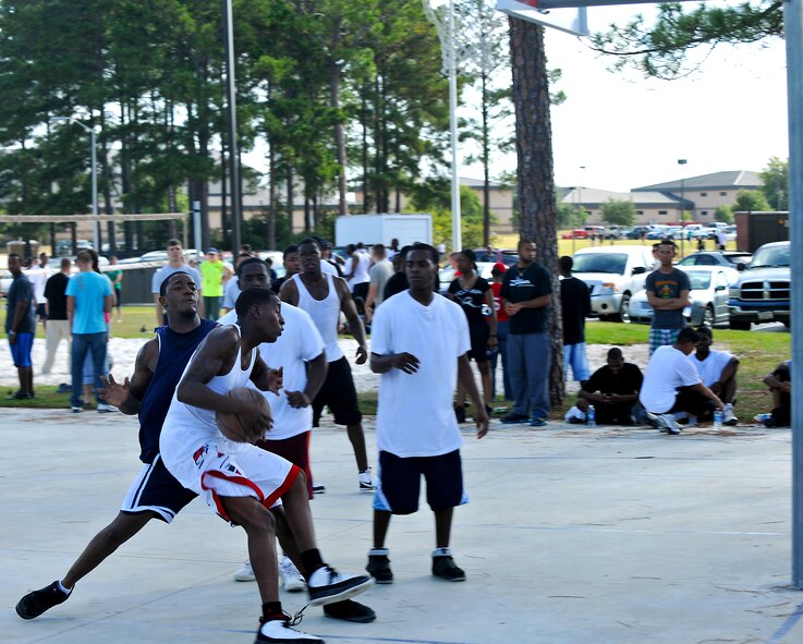 MOODY AIR FORCE BASE, Ga. -- Airmen from Moody participate in a 3-on-3 tournament during Airmen Appreciation Day here Sept. 24.  The competition got serious during the tournament and one individual was fouled hard. (U.S. Air Force photo/Airman 1st Class Joshua Green)

