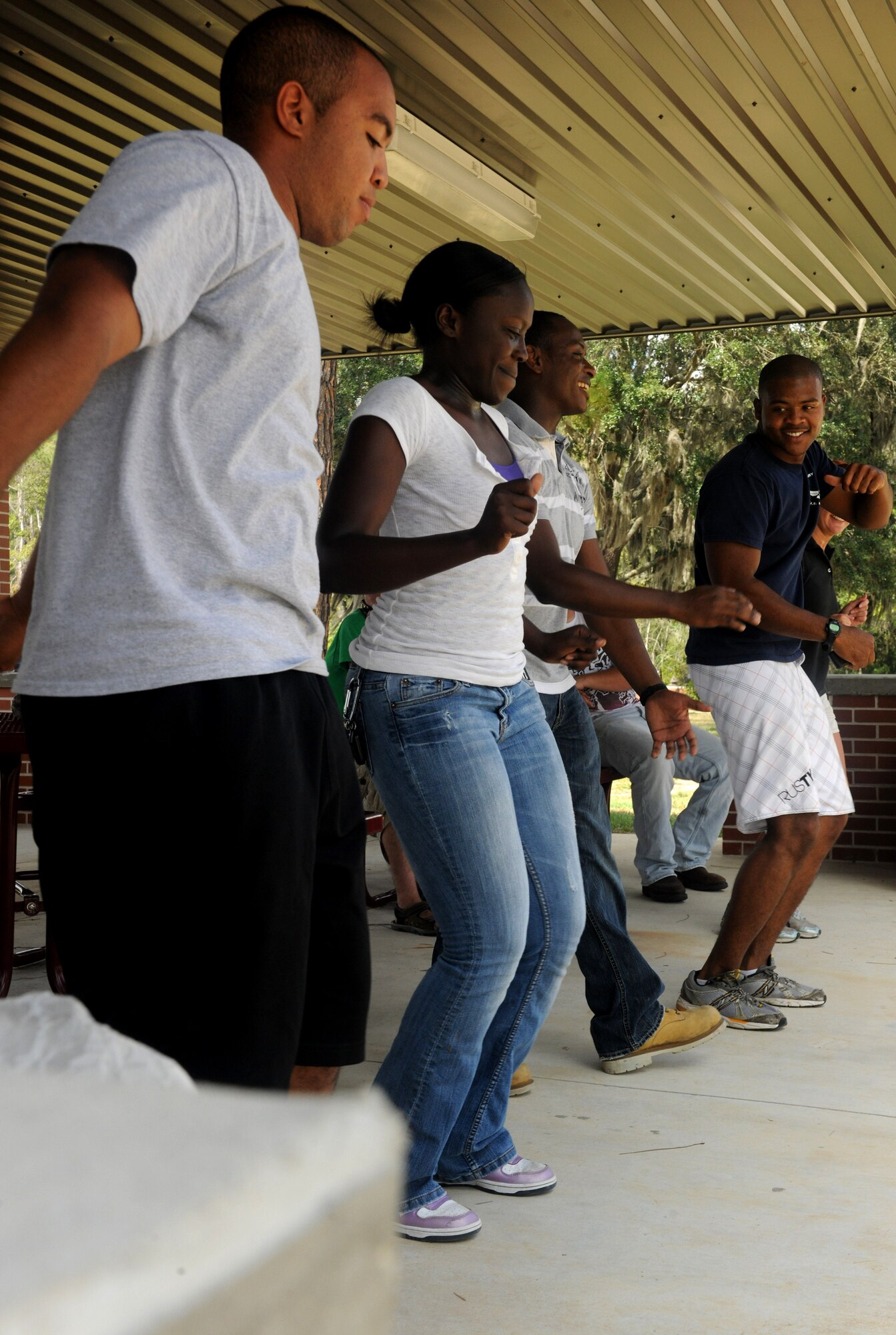 MOODY AIR FORCE BASE, Ga. -- Airmen show their moves while dancing as the music plays during Airman Appreciation Day held here Sept. 24. Airmen were treated to food, music and several activities held throughout the day. (U.S. Air Force photo/Airman 1st Class Benjamin Wiseman)