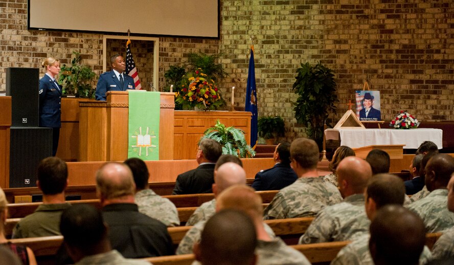 MOODY AIR FORCE BASE, Ga. -- Chaplain (Capt.) Jonathan Runnels, 23rd Wing, provides words of comfort during a memorial service honoring Staff Sgt. Katherine Fisher Sept. 22 at the Base Chapel. During the service, friends and family of Sergeant Fisher read poems and gave remarks on their relationship with her and how she impacted their lives. (U.S. Air Force photo/Senior Airman Jamal D. Sutter)