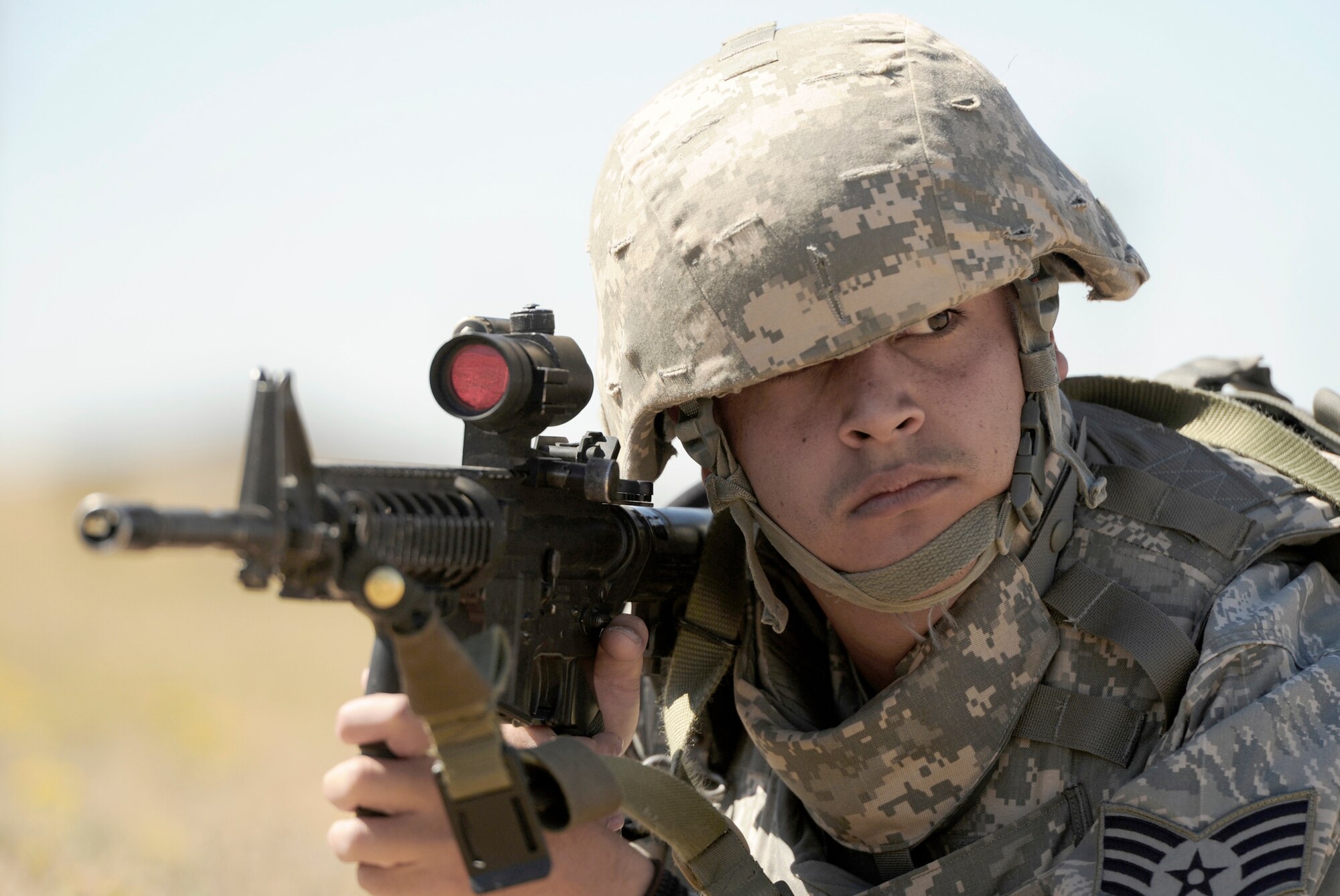 Staff Sgt. Carlos Rosario participates in tactical movement drills during the 75th Security Forces Combat Readiness Training course Sept. 22, 2010, at Hill Air Force Base, Utah. The course teaches Airmen basic tactical movements, land navigation and self aid buddy care. (U.S. Air Force photo/Airman 1st Class Staci Miller)