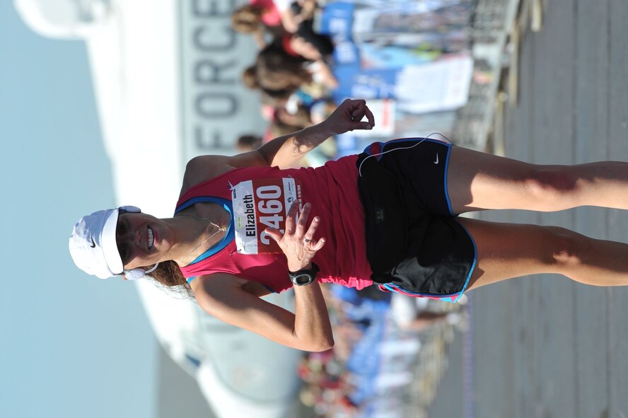 Maj. Elizabeth Shifrin, the 419th Fighter Wing's judge advocate general, runs toward the finish line in the Air Force Marathon held Sept. 18 at Wright-Patterson AFB, Ohio. Major Shifrin hopes to inspire reserve Airmen to stay fit to fight. (Courtesy photo)