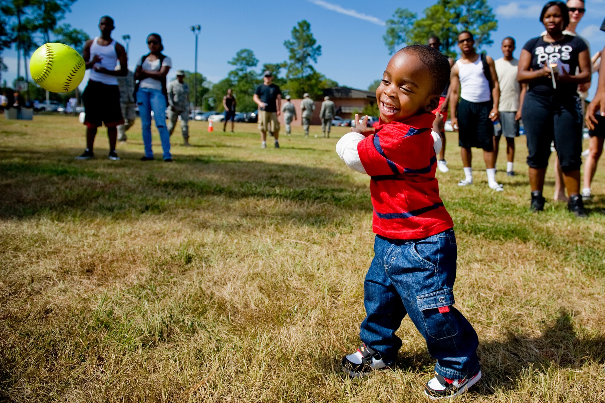 MOODY AIR FORCE BASE, Ga. -- Timothy Russell II, son of Senior Airman Timothy Russell, 23rd Force Support Squadron evaluations representative, throws a softball during Airman Appreciation Day Sept. 24. Airmen brought their families to the event for a day of fun, relaxation and entertainment. (U.S. Air Force photo/Senior Airman Jamal D. Sutter)