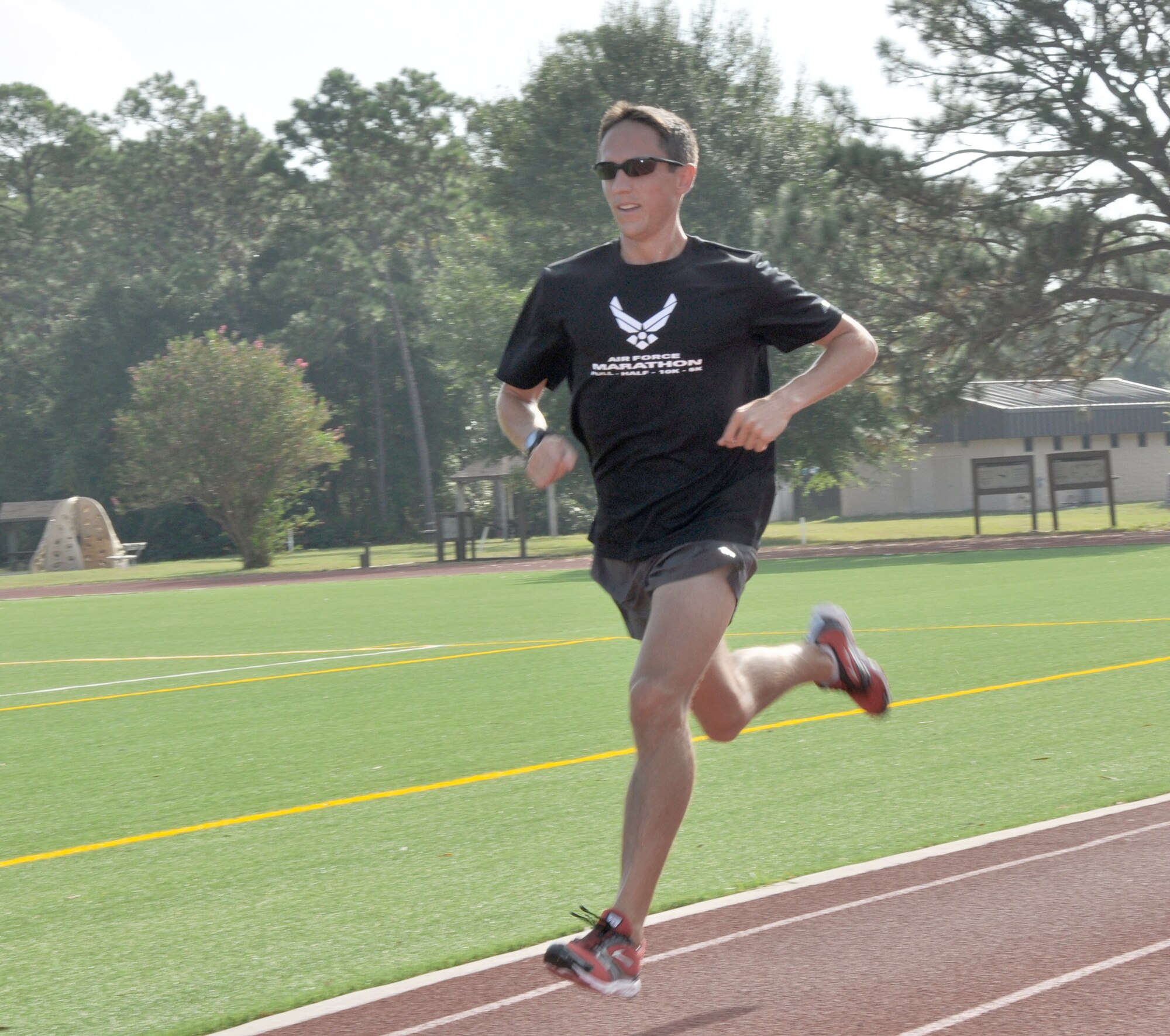 Capt. Ben Payne runs a lap around the track at the Aderholt Fitness Center Sept. 24, 2010 at Hurlburt Field, Fla. Captain Payne finished first in the men's half marathon during the during the 2010 Air Force Marathon at Wright-Patterson Air Force Base, Ohio, Sept. 17-18. Captain Payne is a pilot with the 34th Special Operations Squadron at Hurlburt Field. 