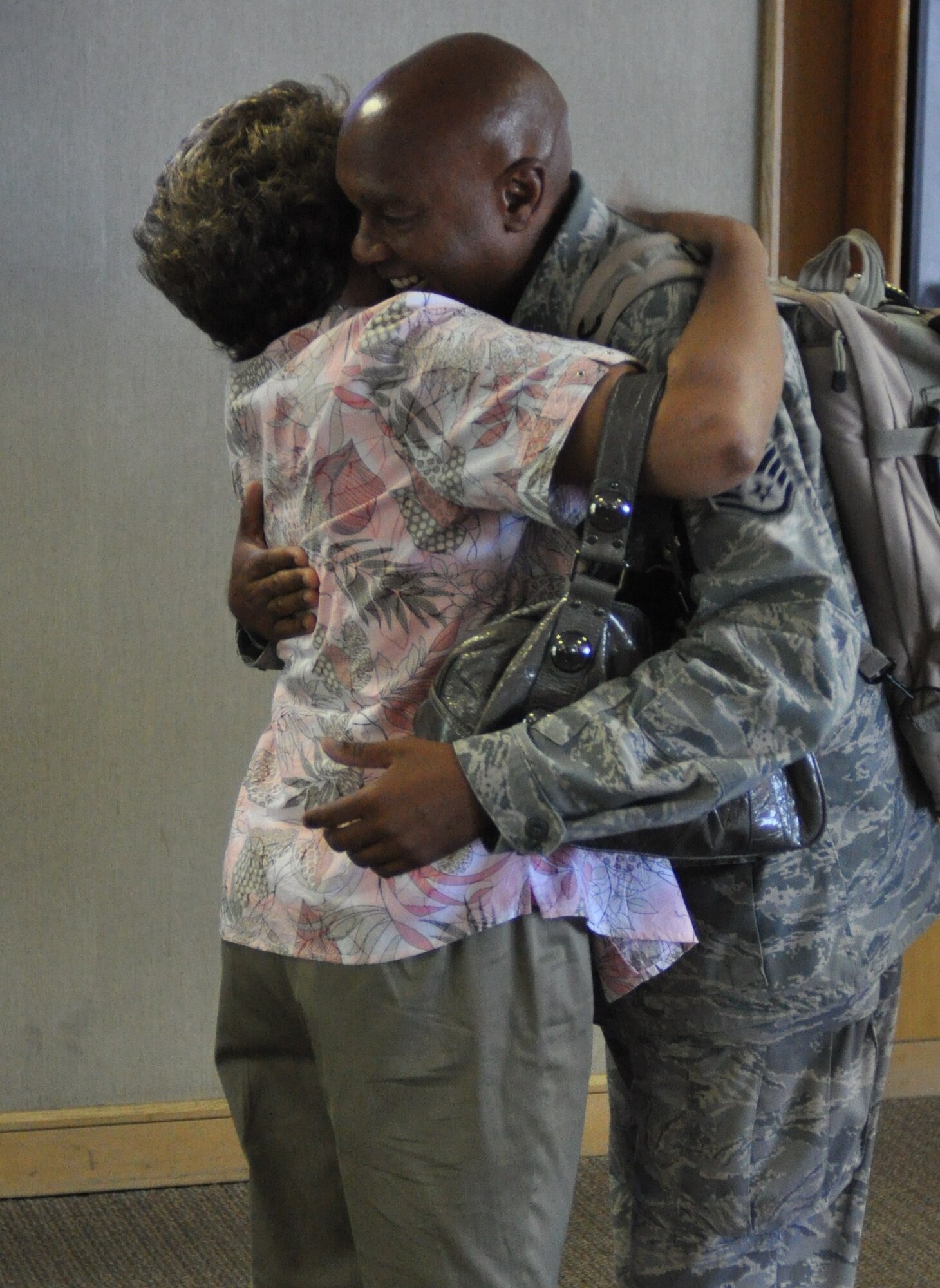 Staff Sgt. Howard Snider is welcomed home Sept. 23, 2010 upon returning to Charleston, S.C. after a four month deployment to locations in Southwest Asia. Sergeant Howard is with the 38th Aerial Port Squadron, Charleston Air Force Base, S.C. (U.S. Photo/Staff Sgt. Shane Ellis)