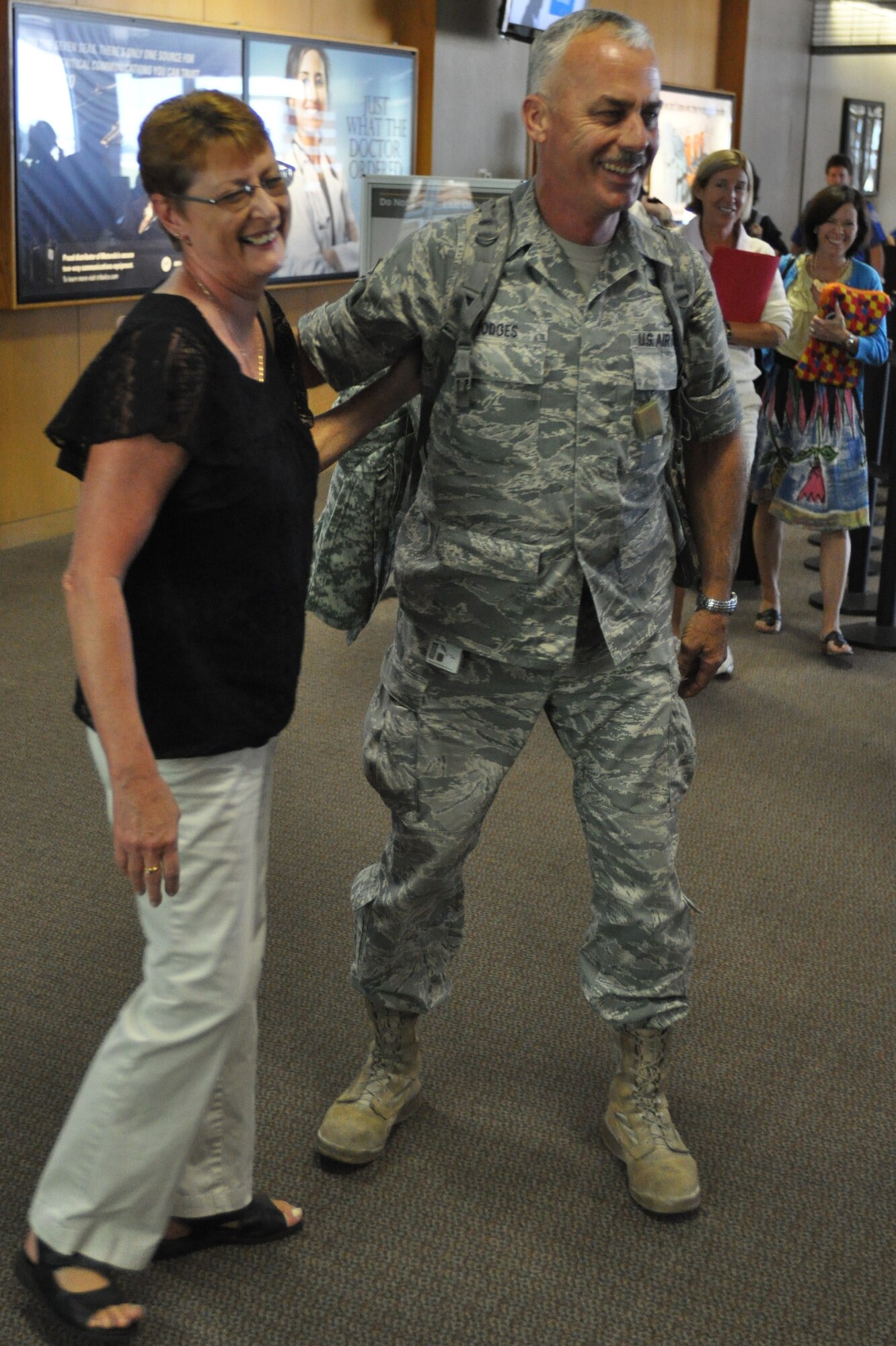 Staff Sgt. Robert Hodges is welcomed home Sept. 23, 2010 upon returning to Charleston, S.C. after a four month deployment to locations in Southwest Asia. Sergeant Hodges is with the 38th Aerial Port Squadron, Charleston Air Force Base, S.C. (U.S. Photo/Staff Sgt. Shane Ellis)