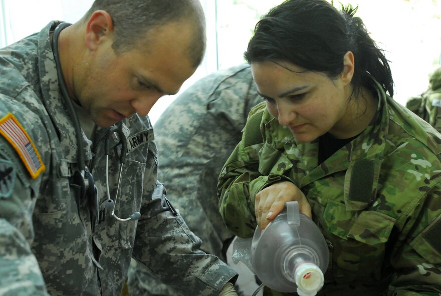 A simulated casualty receives medical attention from U.S. and Polish medical personnel during a mass casualty training exercise held Sept. 18 in Swidwin, Poland during the Jackal Stone 10 exercise. Jackal Stone 10, hosted by Poland and Lithuania this year, is an annual international special operations forces exercise held in Europe. Its objective is to enhance capabilities and interoperability amongst the participating special operations forces and as well as build mutual respect while sharing doctrinal concepts. The exercise, which is coordinated with U.S. Special Operations Command Europe, includes countries from Poland, Lithuania, Latvia, Croatia, Romania and Ukraine. (U.S. Army photo/Pfc. Jordan Johnson