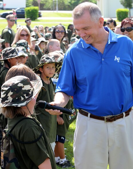 Col. Ricky Rupp, 18th Wing vice commander, welcomes nearly 200 children of Kadena servicemembers participating in 2010 Skoshi Warrior at Marek Park Sept. 25. The annual event gave children, ages 5-18, a chance to experience what their parents go through during deployments. (Air Force/Staff Sgt. Jason Lake)