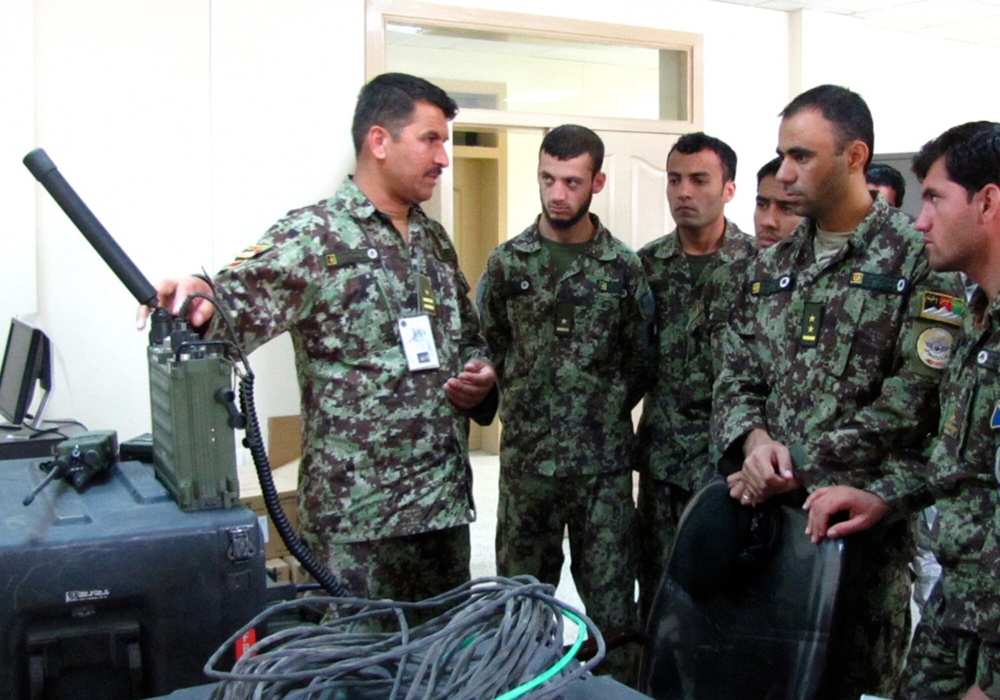 Afghan Air Force Thunder Lab Lieutenants visit the air force Communications squadron on the air force base in Kabul on Sept. 28, 2010. (Photo by Capt. Rob Leese/RELEASED).