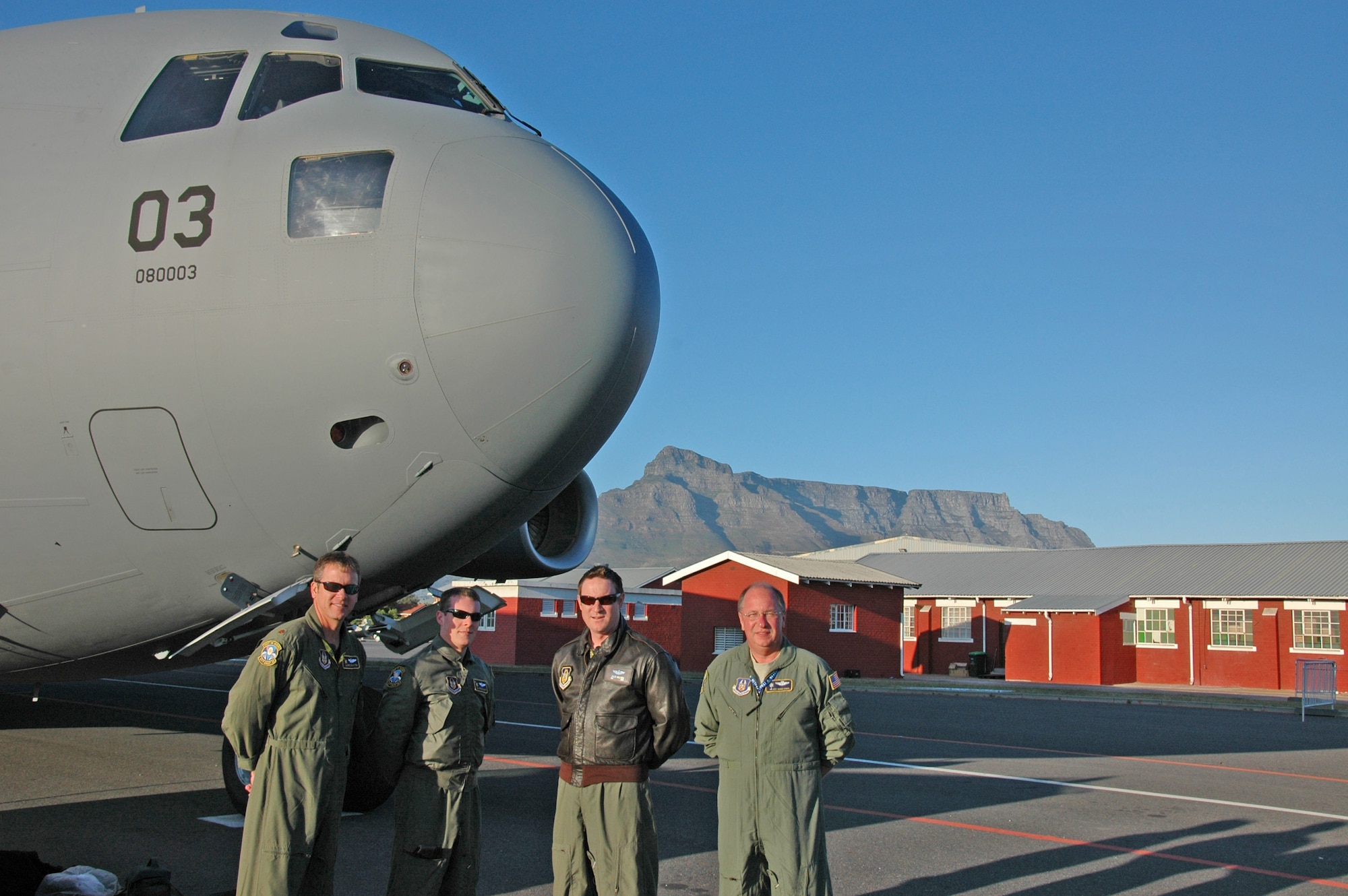 Majors Mike Stratton and Jason Williams along with loadmasters Eric Zilaitis and George Counts, 317th Airlift Squadron Charleston Air Force Base, S.C., maintained the C-17 static display at Ysterplaat Air Force Base, Cape Town South Africa Sept. 21-25. The Africa Aerospace and Defense Exposition was the largest expo of air, land, and sea capabilities on the African continent. (U.S. Air Force photo/2nd Lt. Joe Simms)