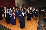 Members of the 502nd Air Base Wing dance the "Cupid Shuffle" during the 502nd ABW Air Force Birthday Ball Sept. 24 at the Gateway Club. The celebration included dancing, socializing, dinner and entertainment from the Air Force Band of the West. (U.S. Air Force photo/Alan Boedeker) 