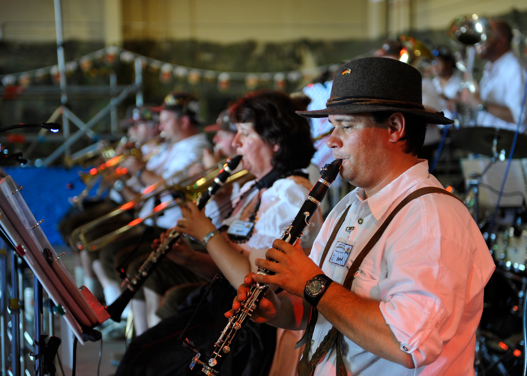 HOLLOMAN AIR FORCE BASE, N.M. -- Members of the Die Lustigen Eyachtaler band from Germany play traditional German music during the 14th Annual Oktoberfest at the German Air Force Maintenance Hangar Sept. 25, 2010. The band marched during the opening parade and continued to play music throughout the evening while guests enjoyed food and drinks. (U.S. Air Force photo by Senior Airman Veronica Stamps / Released)